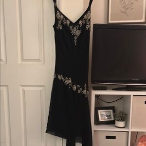 Elegant Black Dress with Floral Accents